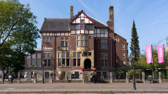 Daytime view of Moco Museum Amsterdam in historic Villa Alsberg on Museumplein.
